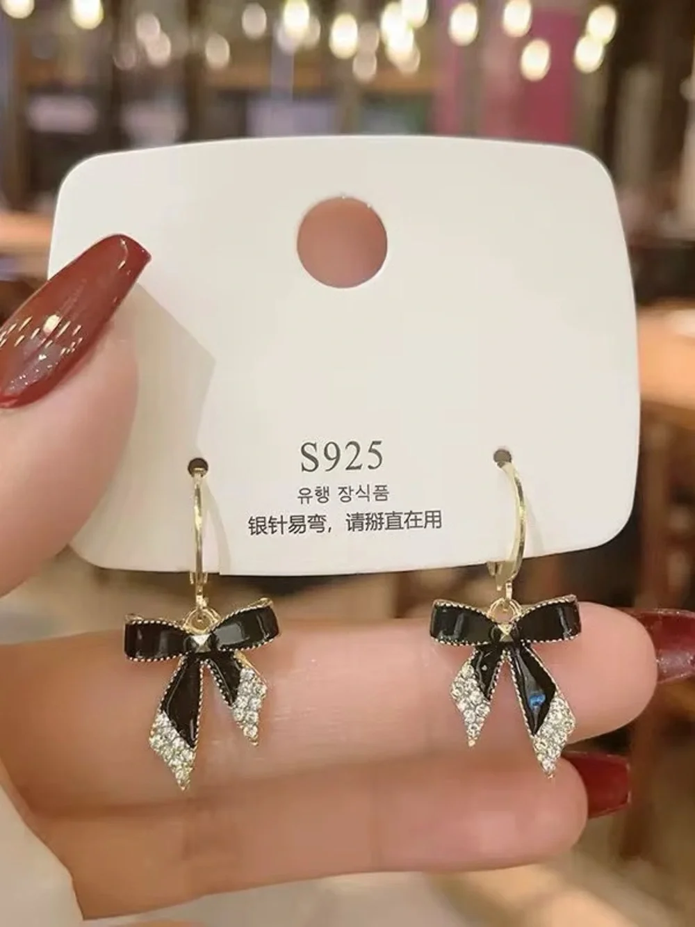 *** Delicate Gold Bow Drop Earrings with Black Enamel and Crystal Accents